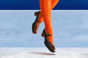 Vibrant Orange Legsin Motion Wallpaper