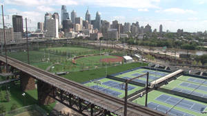 Vibrant Scene At The University Of Pennsylvania Sports Grounds Wallpaper