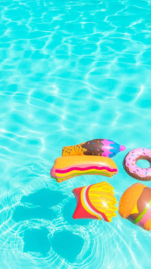 Vibrant Summer Fun In The Swimming Pool Wallpaper