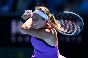 Victoria Azarenka In Purple Making Swing Wallpaper