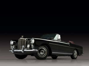 Vintage Bentley Awaits – Stunning Classic Car Wallpaper