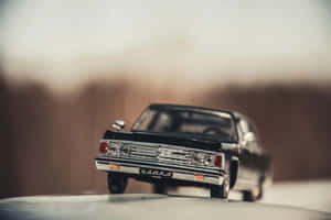 Vintage Black Toy Car Model Wallpaper