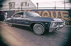 Vintage Elegance: 1967 Chevrolet Impala Wallpaper