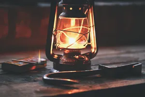 Vintage Lantern On A Table Wallpaper