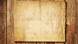 Vintage Styled Old Paper On Wooden Board Wallpaper