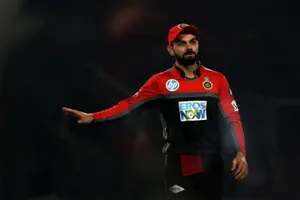 Virat Kohli Rcb In Red Cap Wallpaper