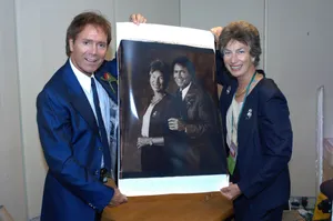 Virginia Wade And Cliff Richard At A Tennis Event Wallpaper