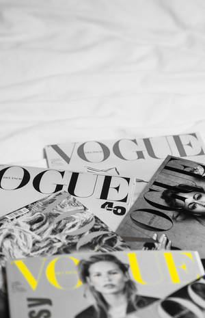 Vogue Magazine Covers In A Bed Wallpaper