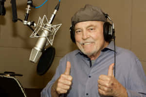 Voice Actorin Recording Studio Thumbs Up Wallpaper