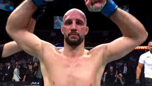 Volkan Oezdemir Raising Arms Wallpaper