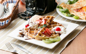 Waffle Topped With Fruit Slices Wallpaper