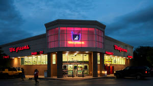 Walgreens Pharmacy - Your Trusted Health Partner At Night Wallpaper