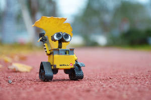 Wall E With Yellow Leaf Wallpaper