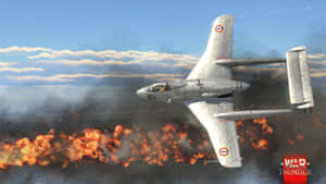 War Thunder Aerial Combat Over Fire Wallpaper