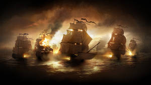 Warship Galleons Burning In Ocean Wallpaper