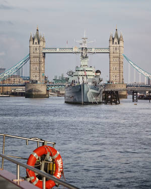 Warship Passing The Tower Bridge Wallpaper
