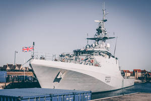 Warship With British Flag Wallpaper