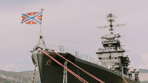 Warship With Union Jack Flag Wallpaper