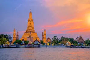 Wat Arun Illumnated By The Sun Wallpaper