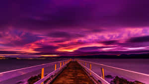 Watch The Perfect Blues And Purples Come Together In This Beautiful Sunset. Wallpaper