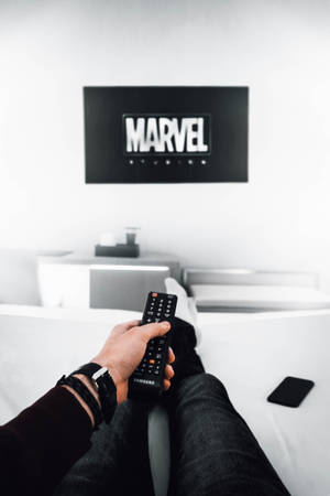 Watching Marvel Movie At Home Wallpaper