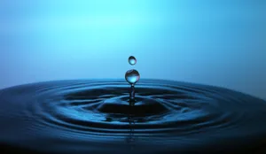Water Droplets On Water Wallpaper
