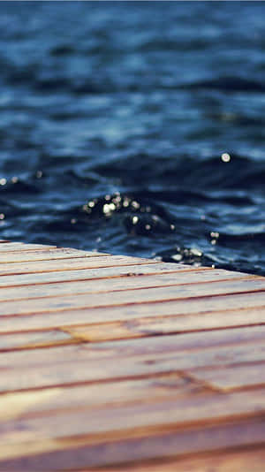 Water Iphone Wooden Platform Structure In The Sea Wallpaper