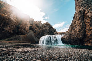 Waterfall Flowing Through Rocks Nature Scenery Wallpaper