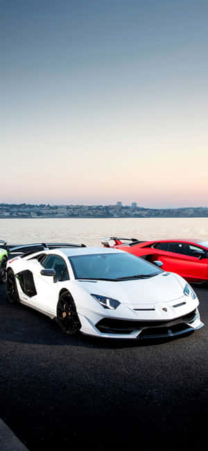 Waterfront With Cars Lamborghini Phone Wallpaper