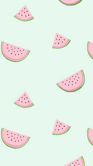 Watermelon Slices On A Green Background Wallpaper