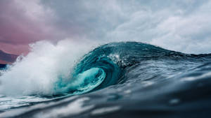 Wave With Glowing Water Wallpaper