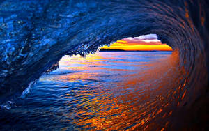Wave With Sun Reflection Wallpaper