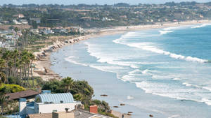 Wavy Waters On Malibu Beach Wallpaper