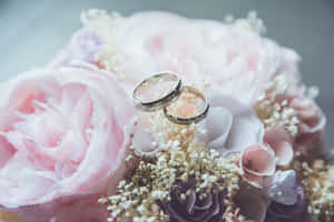 Wedding Ring On Flower Bouquet Wallpaper