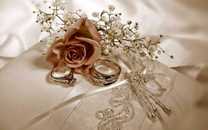 Wedding Rings And Flower Wallpaper