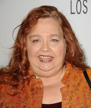 Well-beloved Actress Conchata Ferrell In Vibrant Orange Outfit Wallpaper