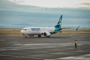 Westjet Airline Preparing To Board Wallpaper