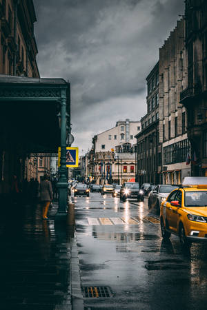Wet And Gloomy City Street Wallpaper
