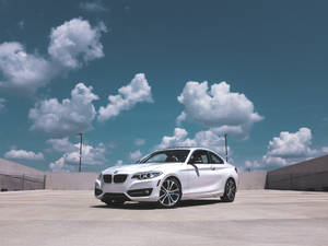 White Bmw Car On Rooftop Wallpaper