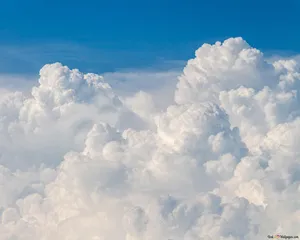 White Clouds In An Infinite Blue Sky Wallpaper