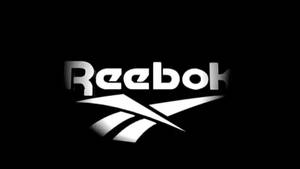 White Fading Reebok Logo Wallpaper