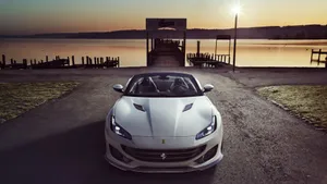 White Ferrari On Bay Wallpaper