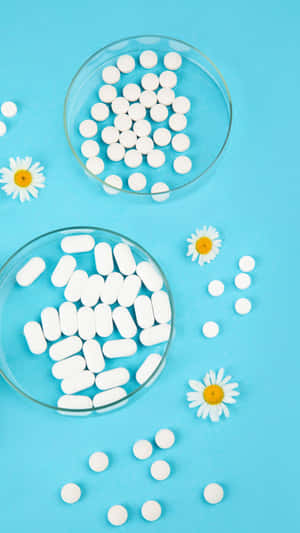 White Pills Daisies Blue Background Wallpaper