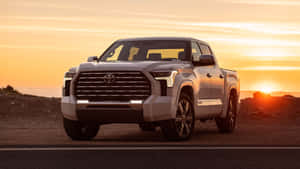 White Tundra Car With Sunset Wallpaper