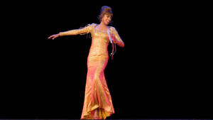 Whitney Houston In Gold Dress Wallpaper