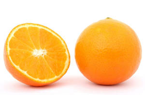 Whole Tangelo Fruit And Half Wallpaper