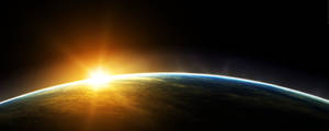 Widescreen Sunrise From Space Wallpaper