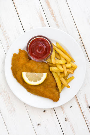 Wiener Schnitzel On White Platter Wallpaper