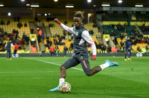 Wilfried Zaha In Indoor Football Field Wallpaper