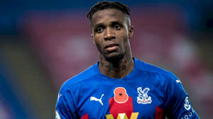 Wilfried Zaha Wearing Blue Wallpaper